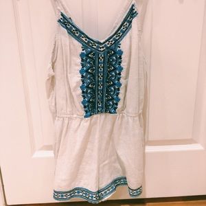 Macy’s Romper with blue thread trim